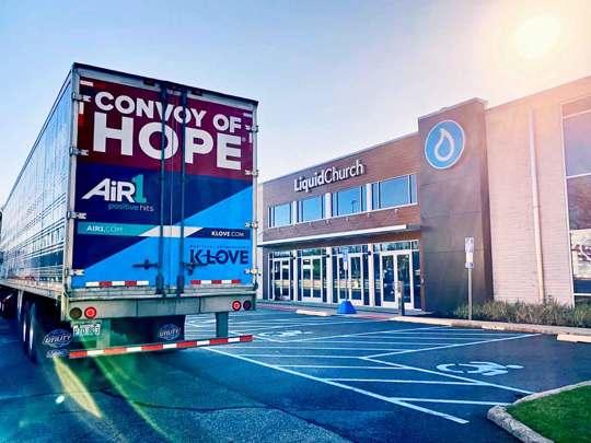 Convoy of Hope big rig outside a church