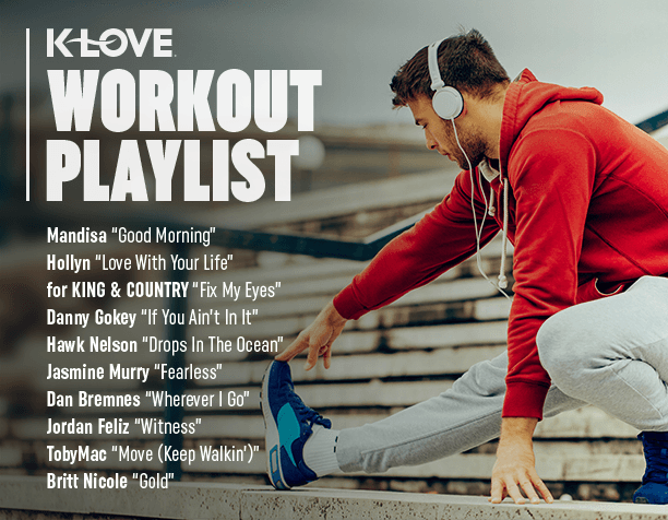 Workout playlist written in man stretching 